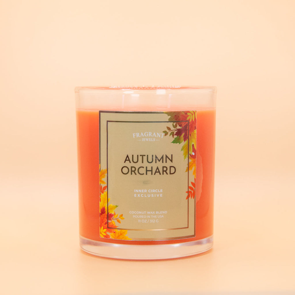 Autumn Orchard candle jar with clear lid and orange wax