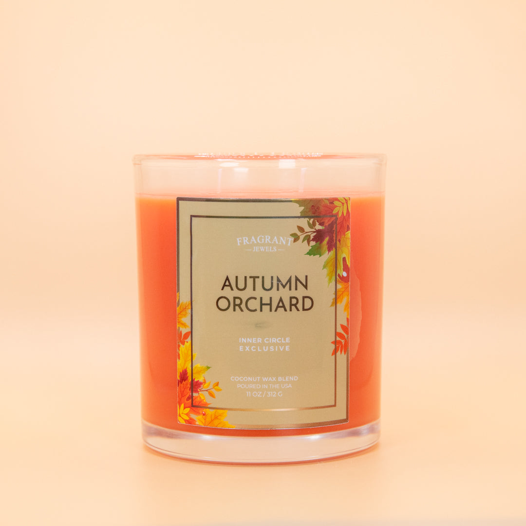 Autumn Orchard candle jar with clear lid and orange wax