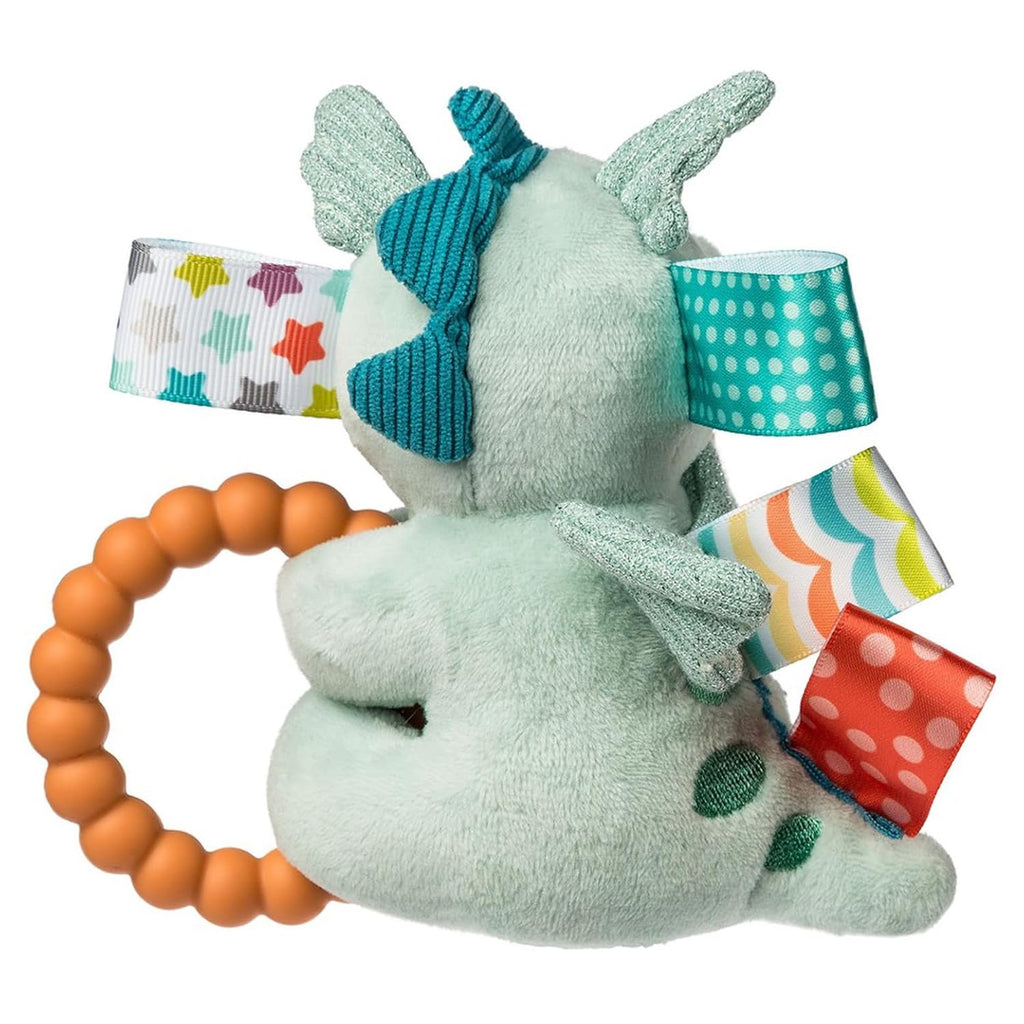 Mint plush elephant baby toy with blue bow details, fabric tags, and brown teething ring