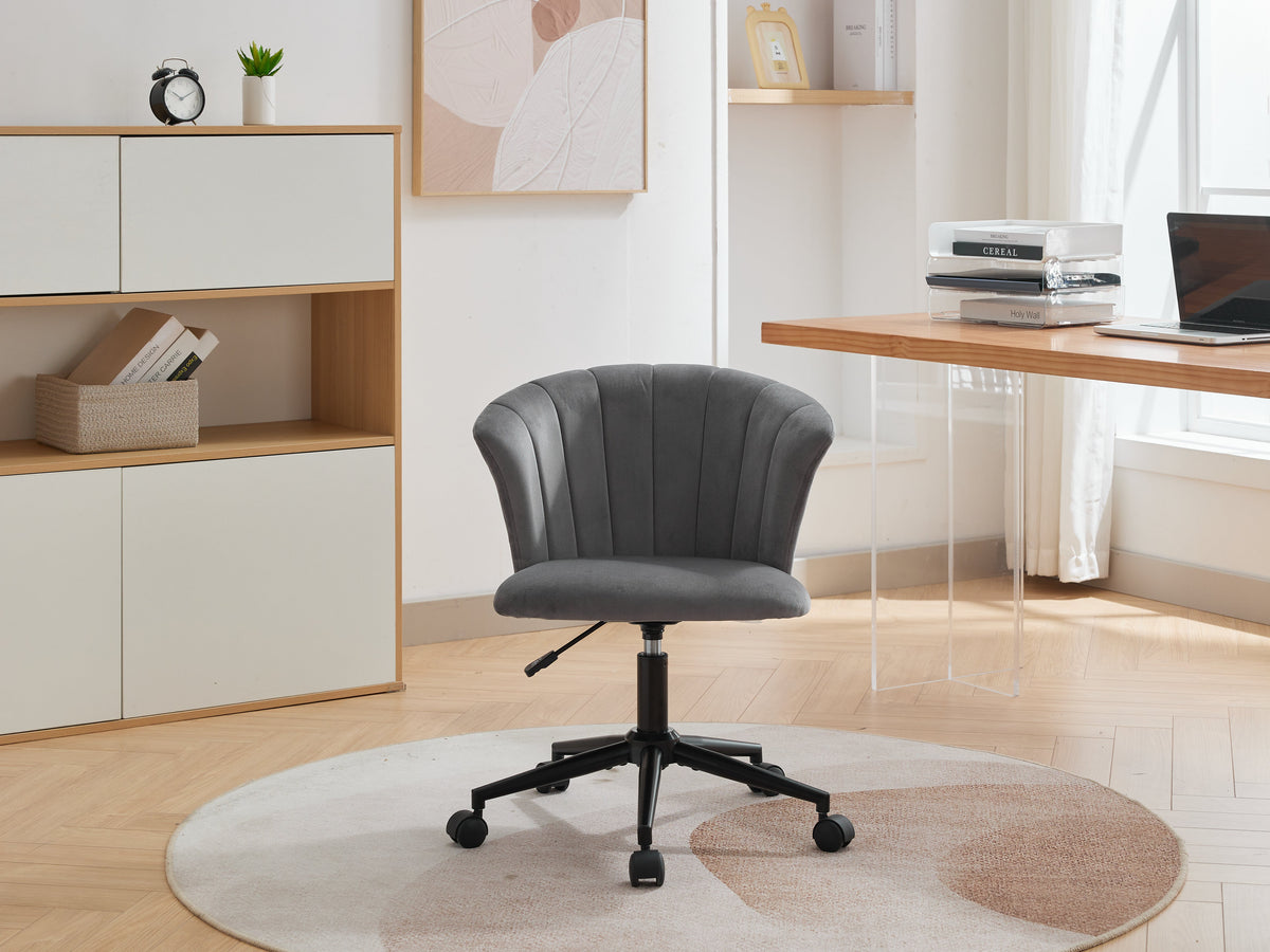 Grey velvet swivel office chair with curved back and black five-star base