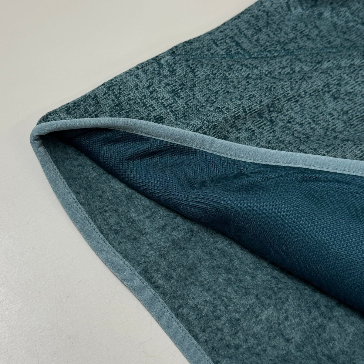 Men's teal fleece full-zip jacket with contrast inner hood lining