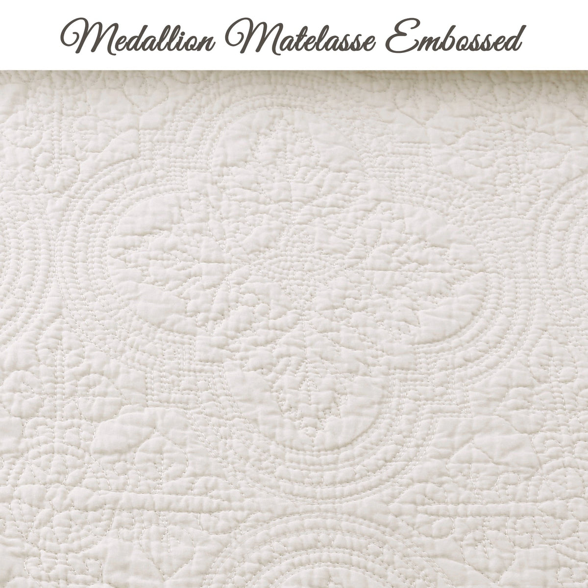 Ivory quilt surface with embossed medallion pattern and raised quilted texture