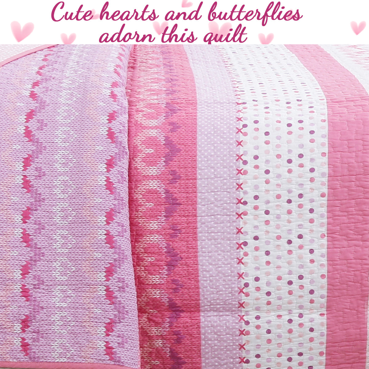 Pink and white reversible quilt with heart and butterfly motifs on striped panels