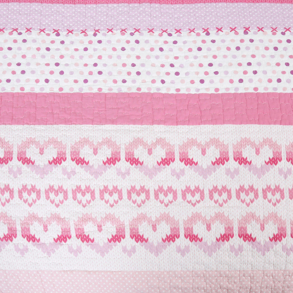 Quilted pink and white striped section with cross-stitch dots and zigzag trim