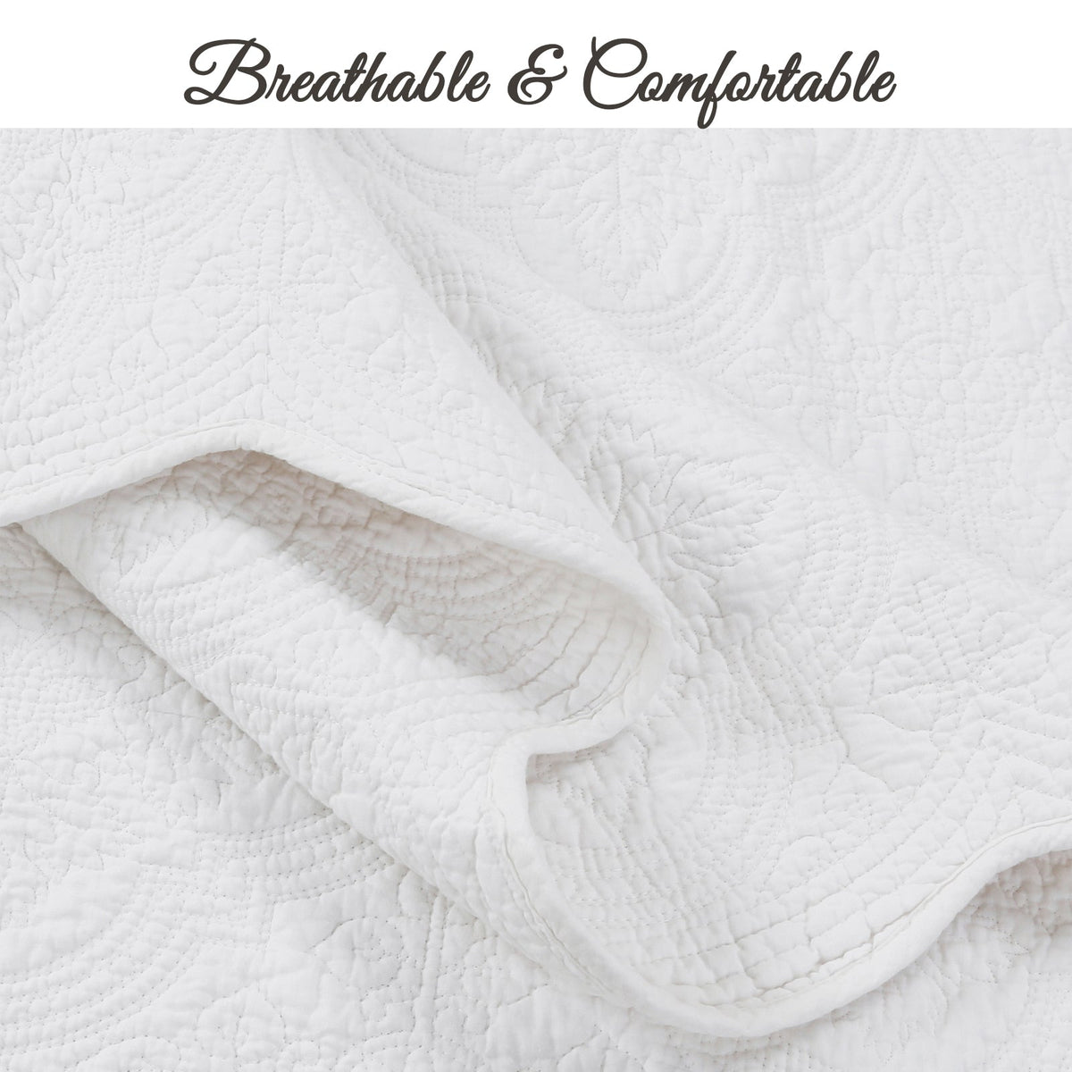 White quilt close-up showing soft stitched channels and allover medallion texture