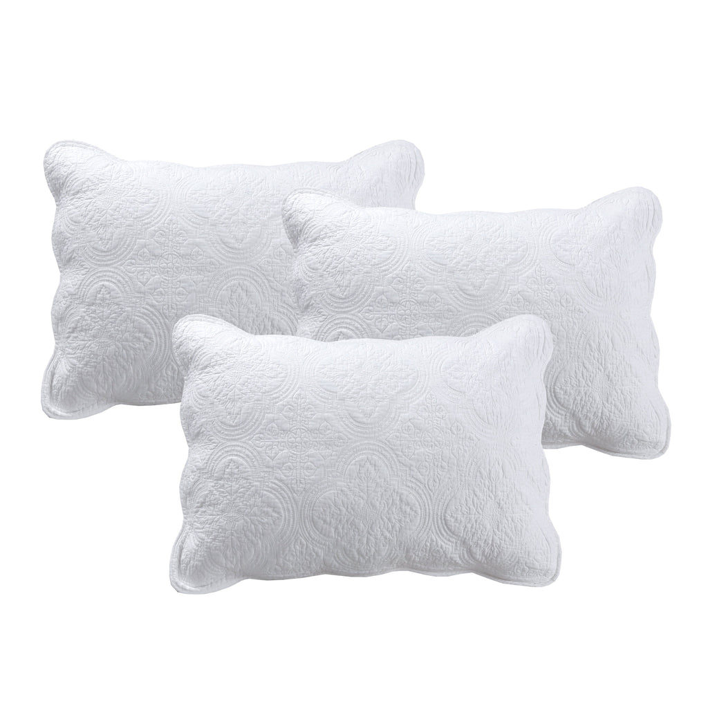 White daybed decorative pillows set with quilted swirl pattern
