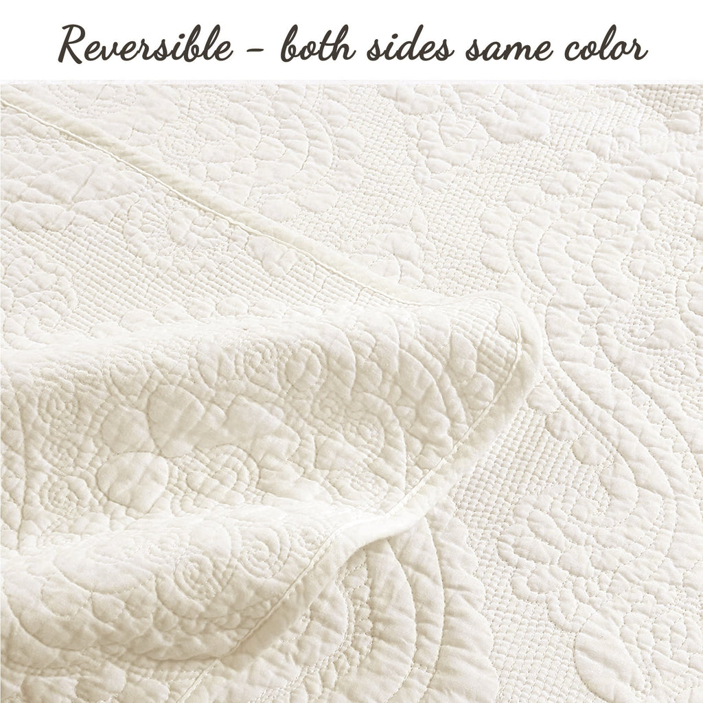 Reversible ivory quilt with same-color quilting texture on both sides