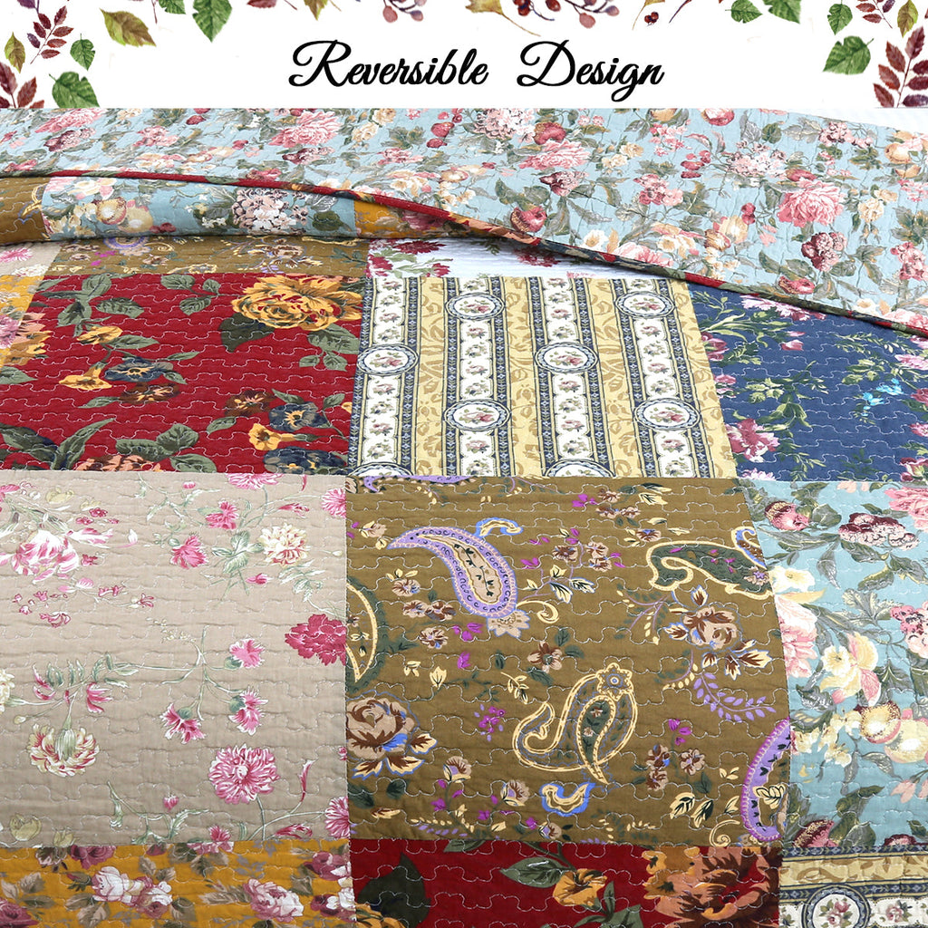 Reversible patchwork quilt with floral, paisley, and striped panels in warm and cool tones