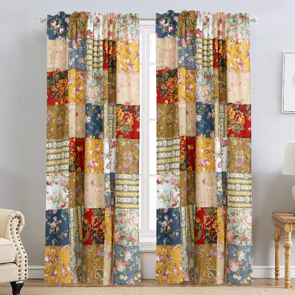 Pair of floral patchwork curtain panels with gathered tops in red, blue, and gold tones