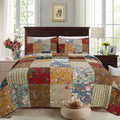 Reversible cotton quilt bedding set with colorful floral and paisley patchwork blocks