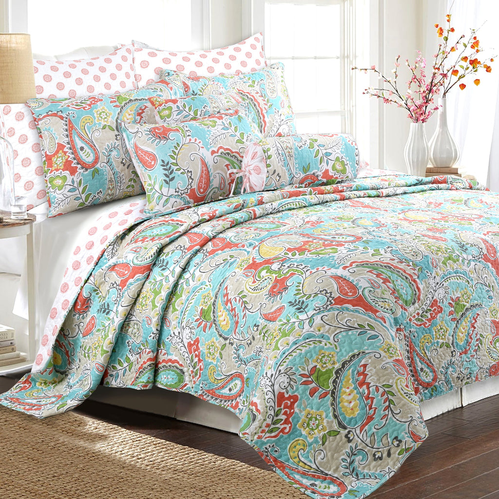 Paisley floral throw pillows (3) on bed, multicolor teal green orange design