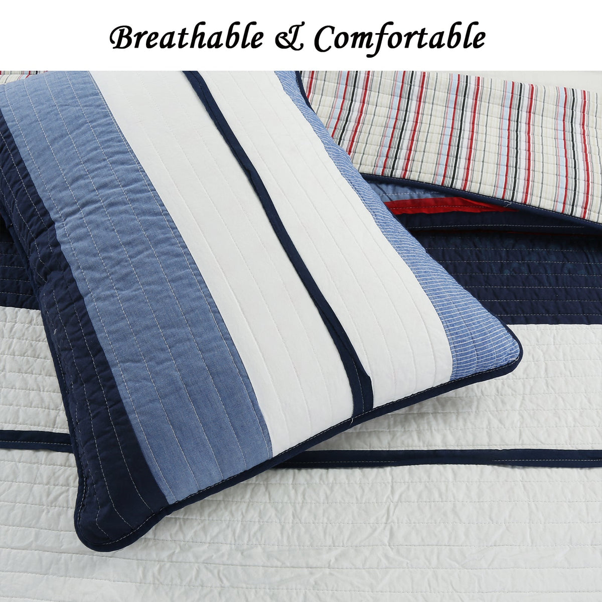 Reversible quilt with blue and white diagonal paneling, navy border, and red edge