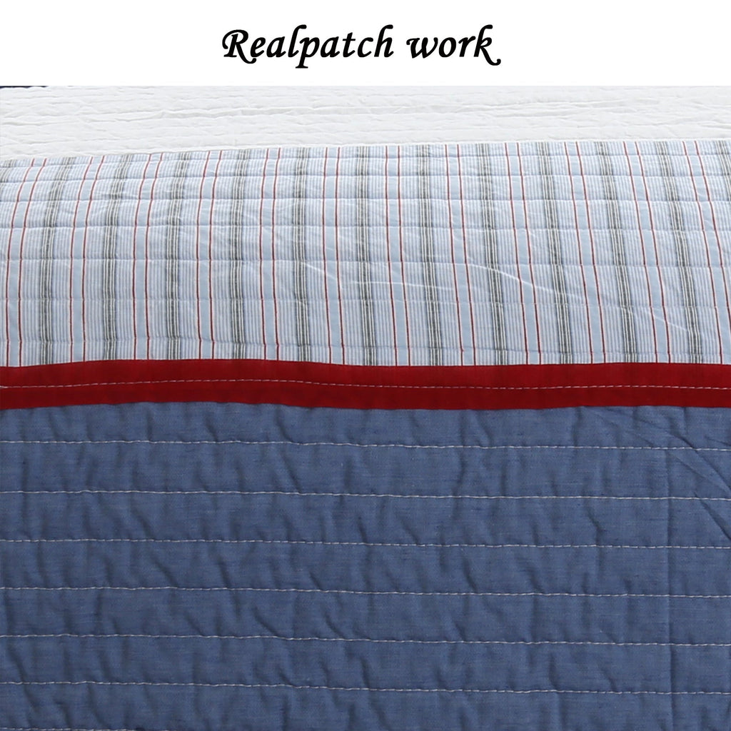 Reversible quilt top with pinstripe plaid rows, red accent band, and blue backing