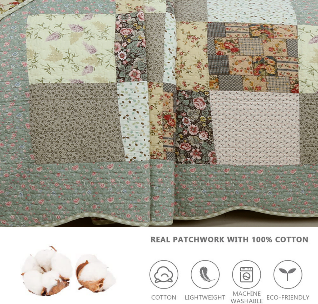Reversible patchwork quilt laid flat with floral squares in teal, cream, and gray