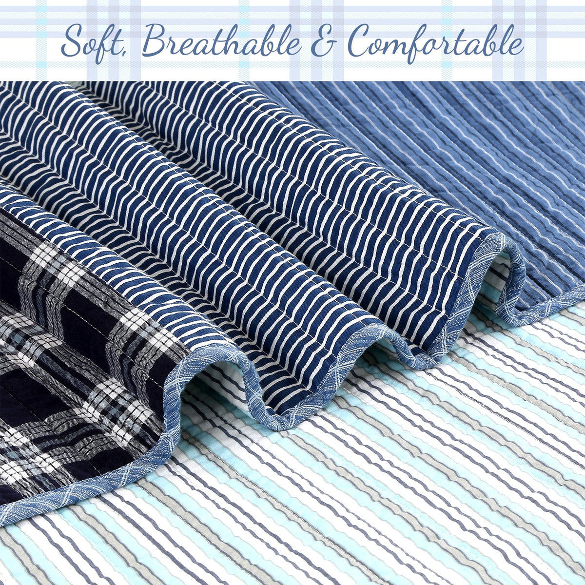 Blue striped reversible quilt fabric with black plaid accent panel