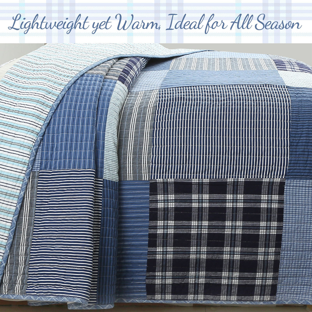 Folded reversible quilt bedding set with blue stripes and black plaid patch
