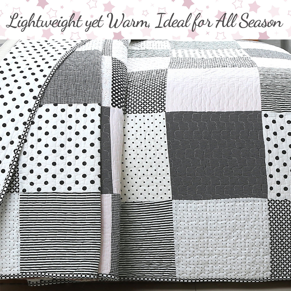 Lightweight reversible quilt with black-and-white patchwork squares, dots, and stripes