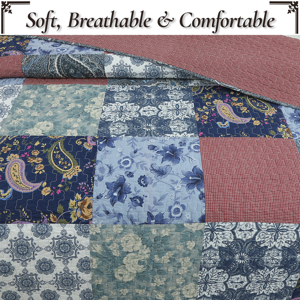 Patchwork quilt with mixed blue floral prints, paisley blocks, and red check squares