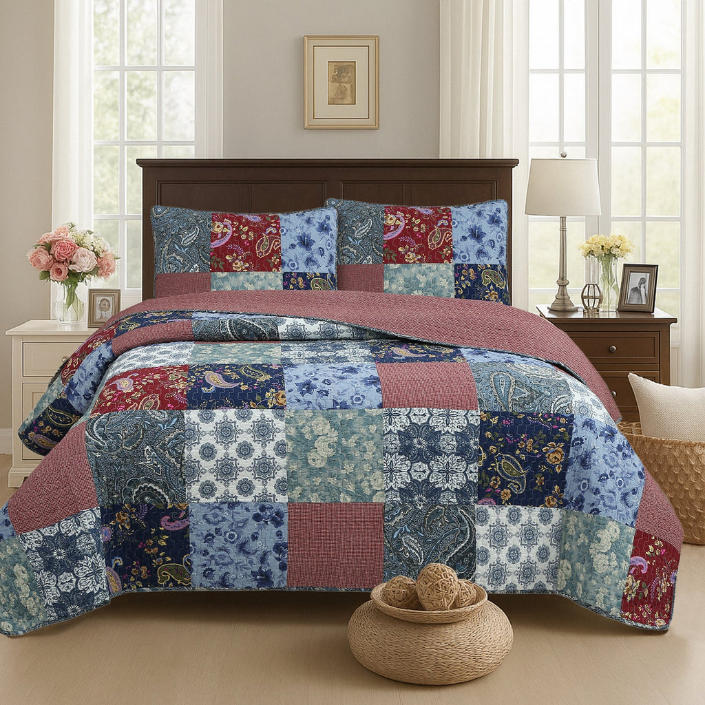 Patchwork quilt bedding set with blue and burgundy floral paisley blocks and taupe trim