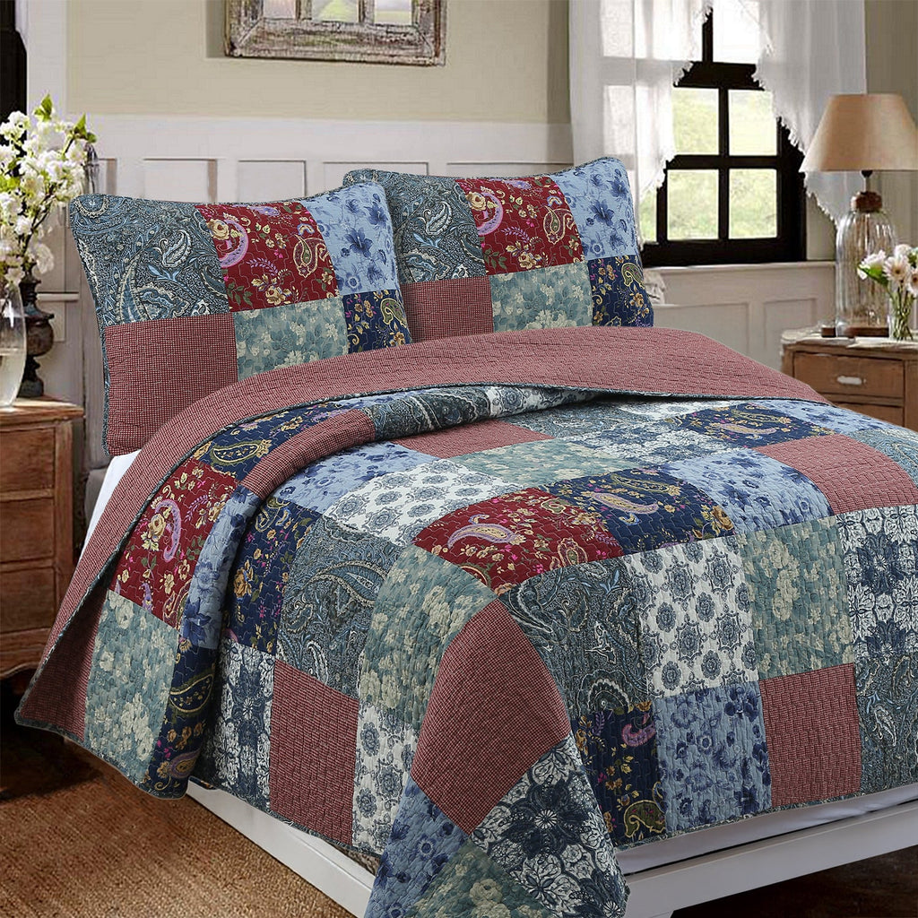 Patchwork quilt bedding set with blue and burgundy floral paisley blocks and taupe accents