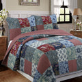 Patchwork quilt bedding set with blue and burgundy floral paisley blocks and taupe accents