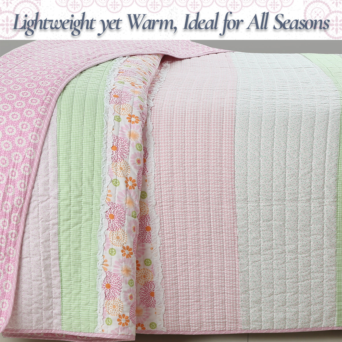 Lightweight cotton quilt showing reversible pastel patchwork panels in pink, green, white