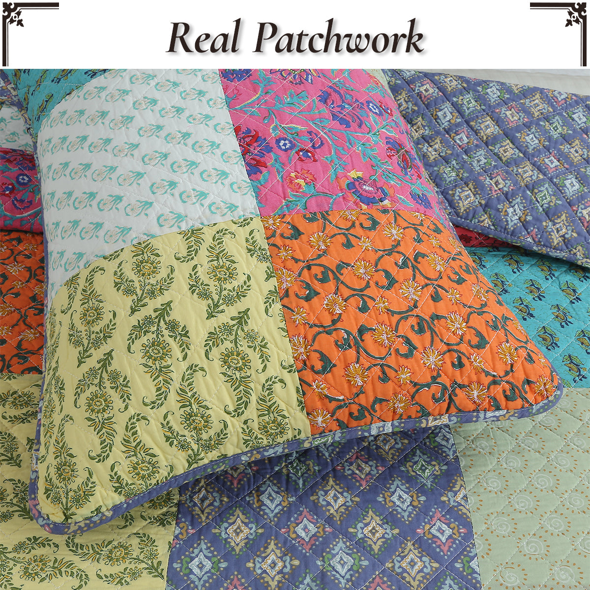 Close-up patchwork quilt squares in teal, pink, orange, and blue floral prints