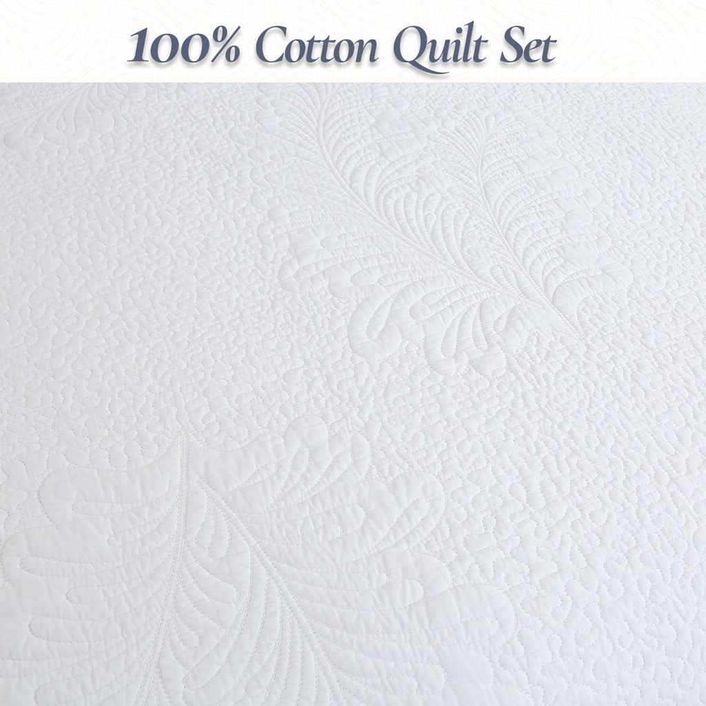 White 100% cotton quilt with raised palm leaf quilting texture