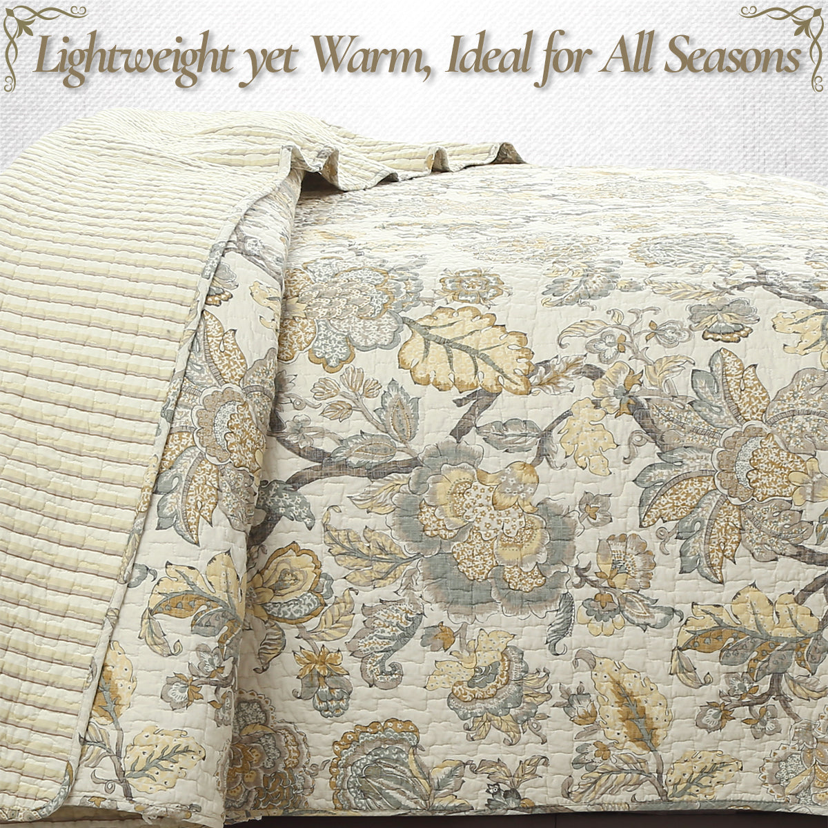 Lightweight quilt with botanical floral print in cream, tan, and muted gray