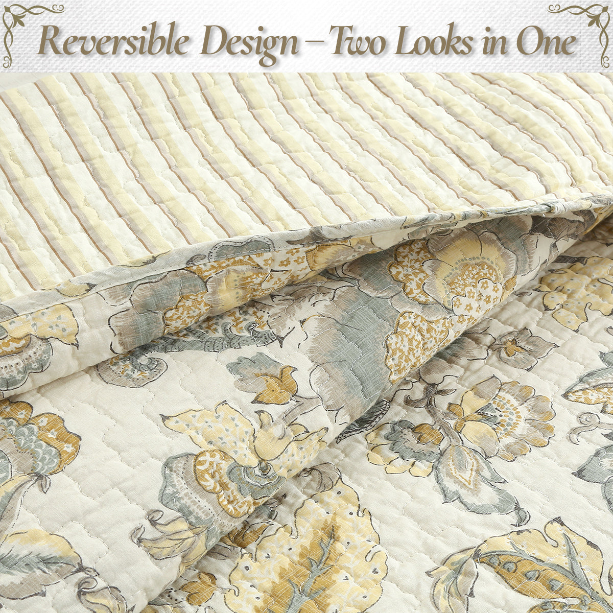 Reversible quilt showing light side with floral print, cream with muted gray and gold