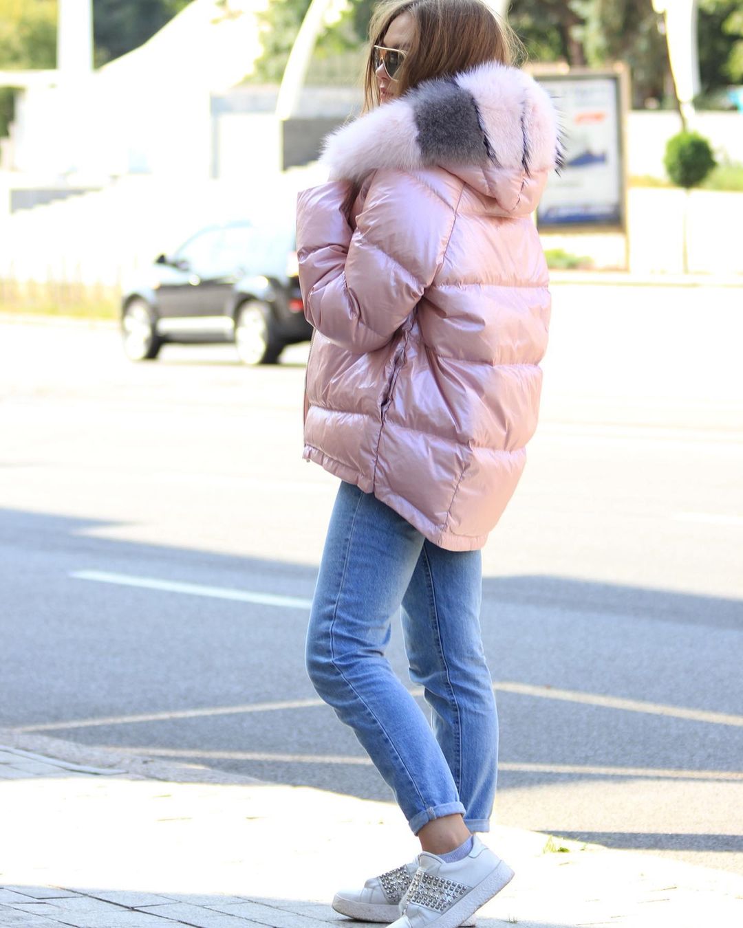 Reversible puffer down coat, pale pink back view with faux fur hood trim