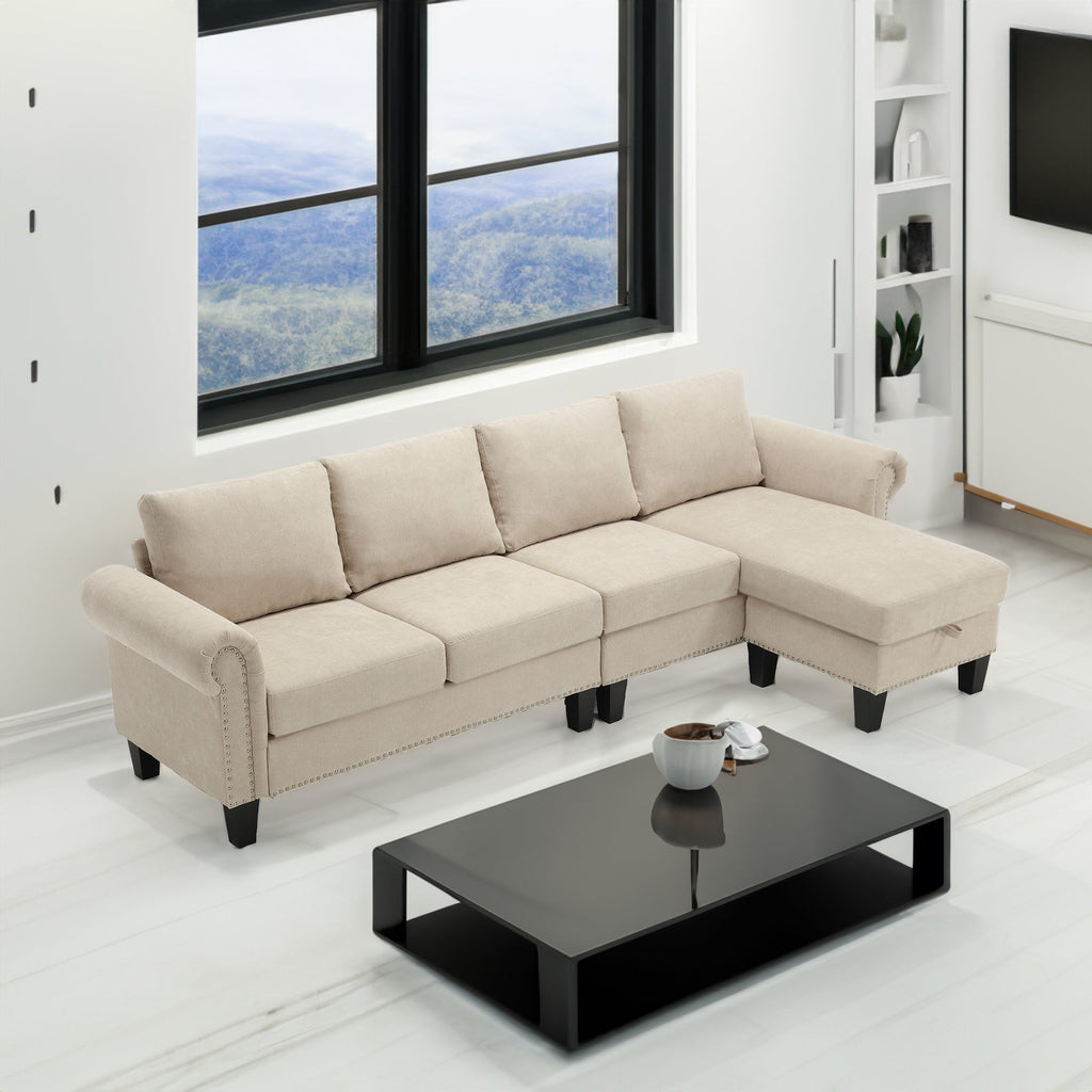Beige L-shaped sectional sofa with corner chaise, tufted cushions, and dark legs.