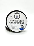 Round dog & puppy shampoo bar container, labeled Lavender and Cedarwood