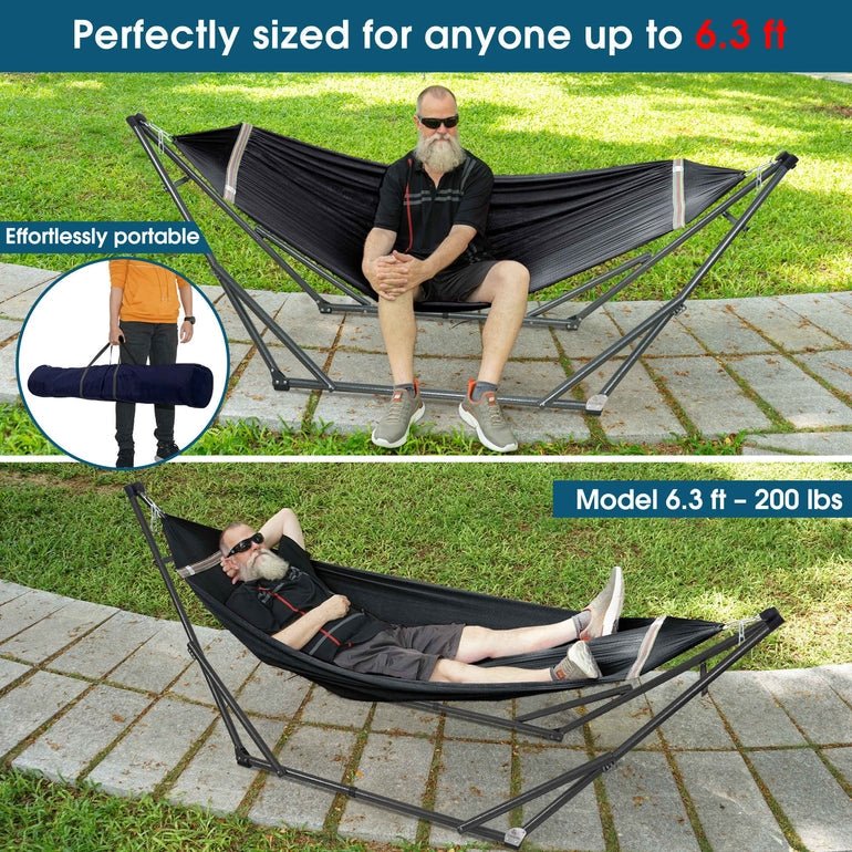 Black hammock with stand, person reclining in suspended fabric bed with multicolor trim