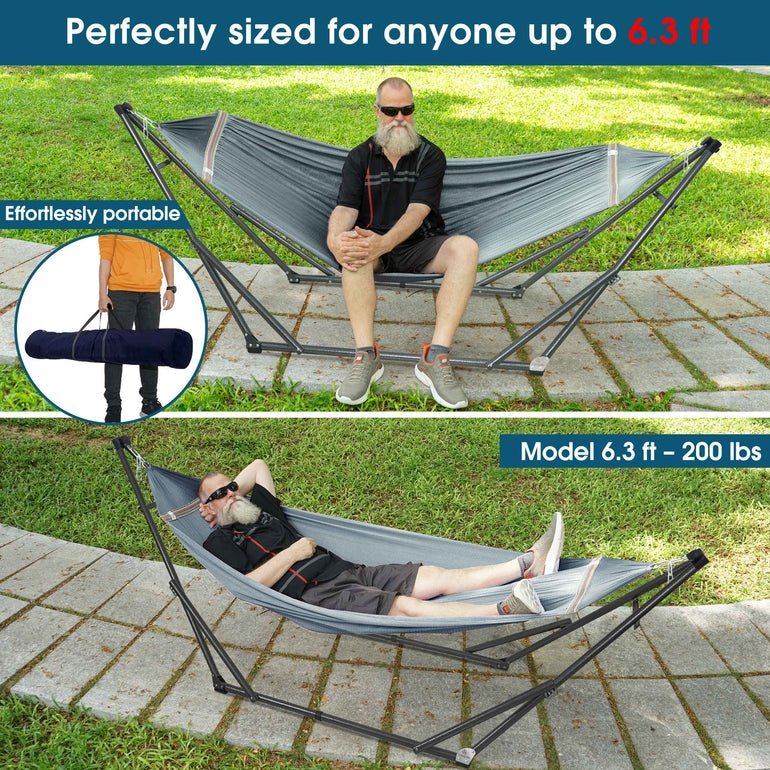 Dark gray hammock on a steel stand, shown assembled and in use
