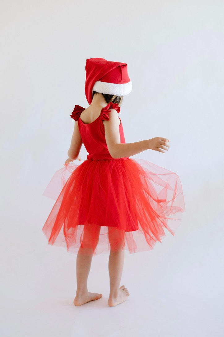 Red sleeveless tulle holiday dress with Santa hat and bow shoulder detail
