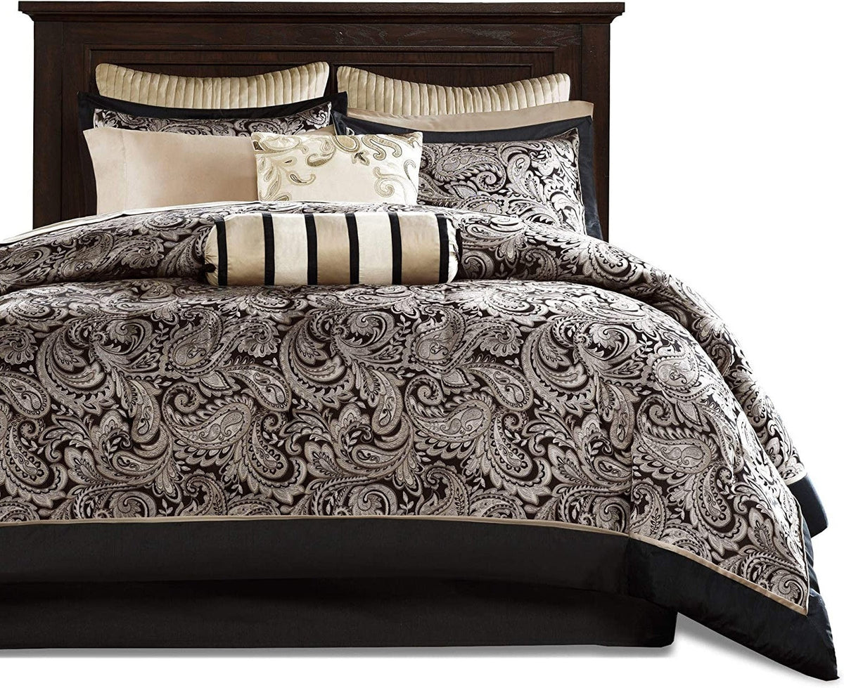 Queen comforter set with black-and-white paisley comforter and striped pillows