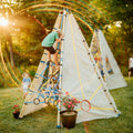 Canvas play tent with blue rope climbing net and circular rings