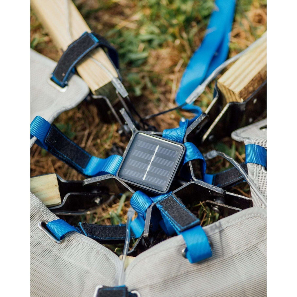 Solar light controller and straps in outdoor tent fabric for mounting