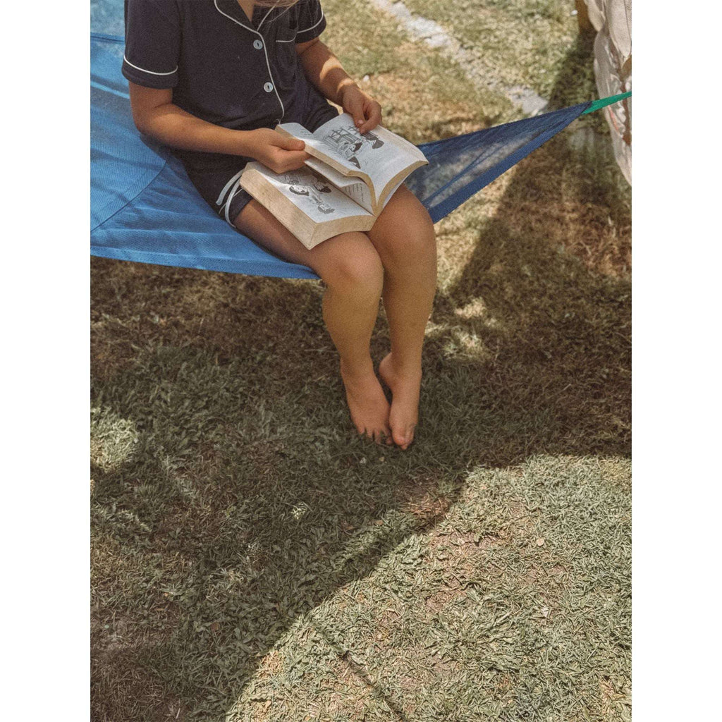 Play tent floor area with blue fabric floor mat