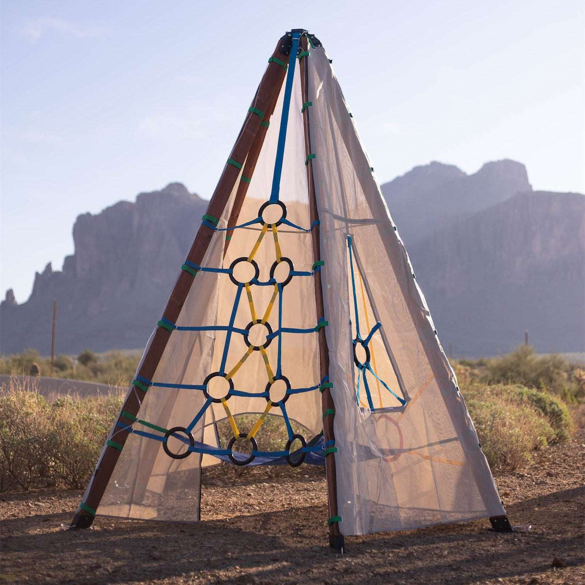 Canvas teepee play tent with blue rope web and round ring grips