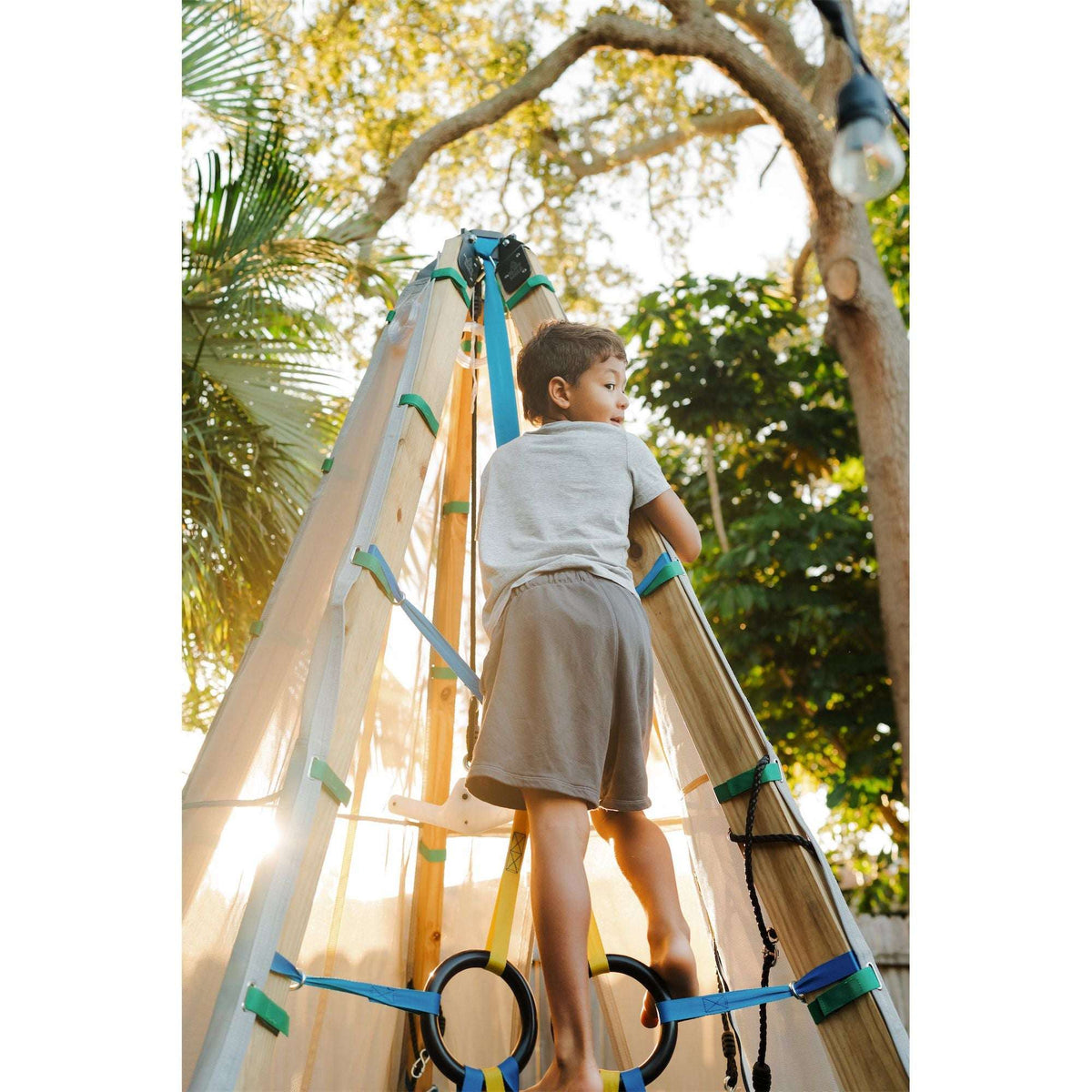 Play tent with blue rope climbing rungs and see-through canvas side panels