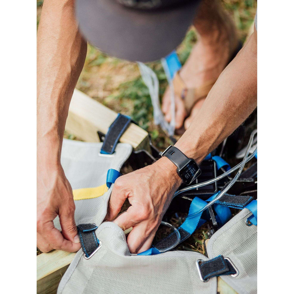 Solar controller mounted on tent fabric with blue mounting straps