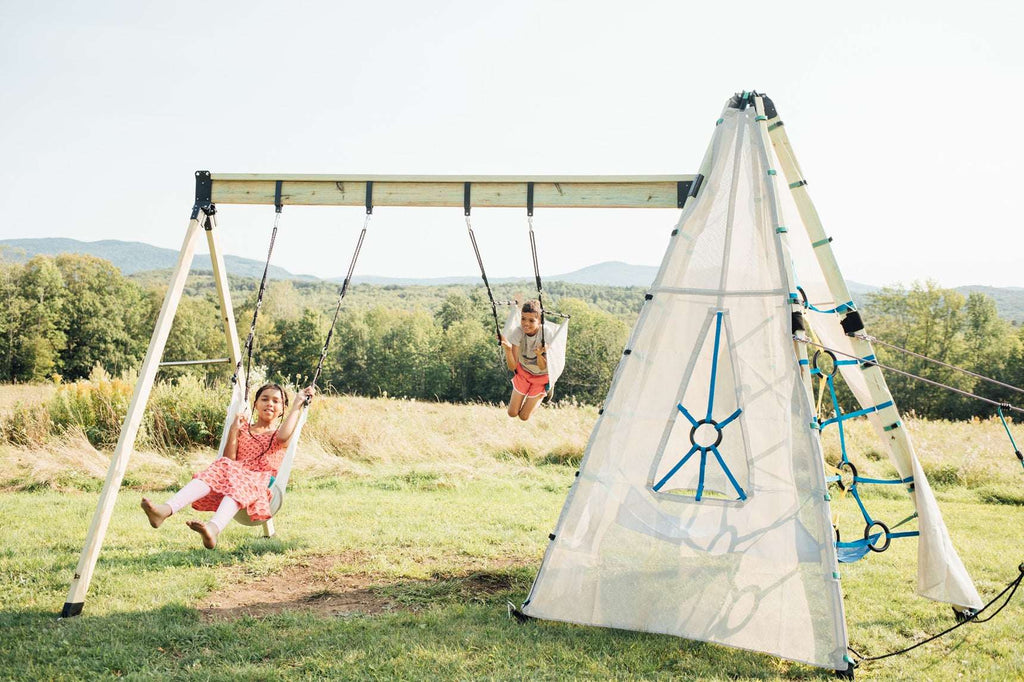 Swing arm adaptor on a wooden A-frame with hanging swing ropes and tent canopy