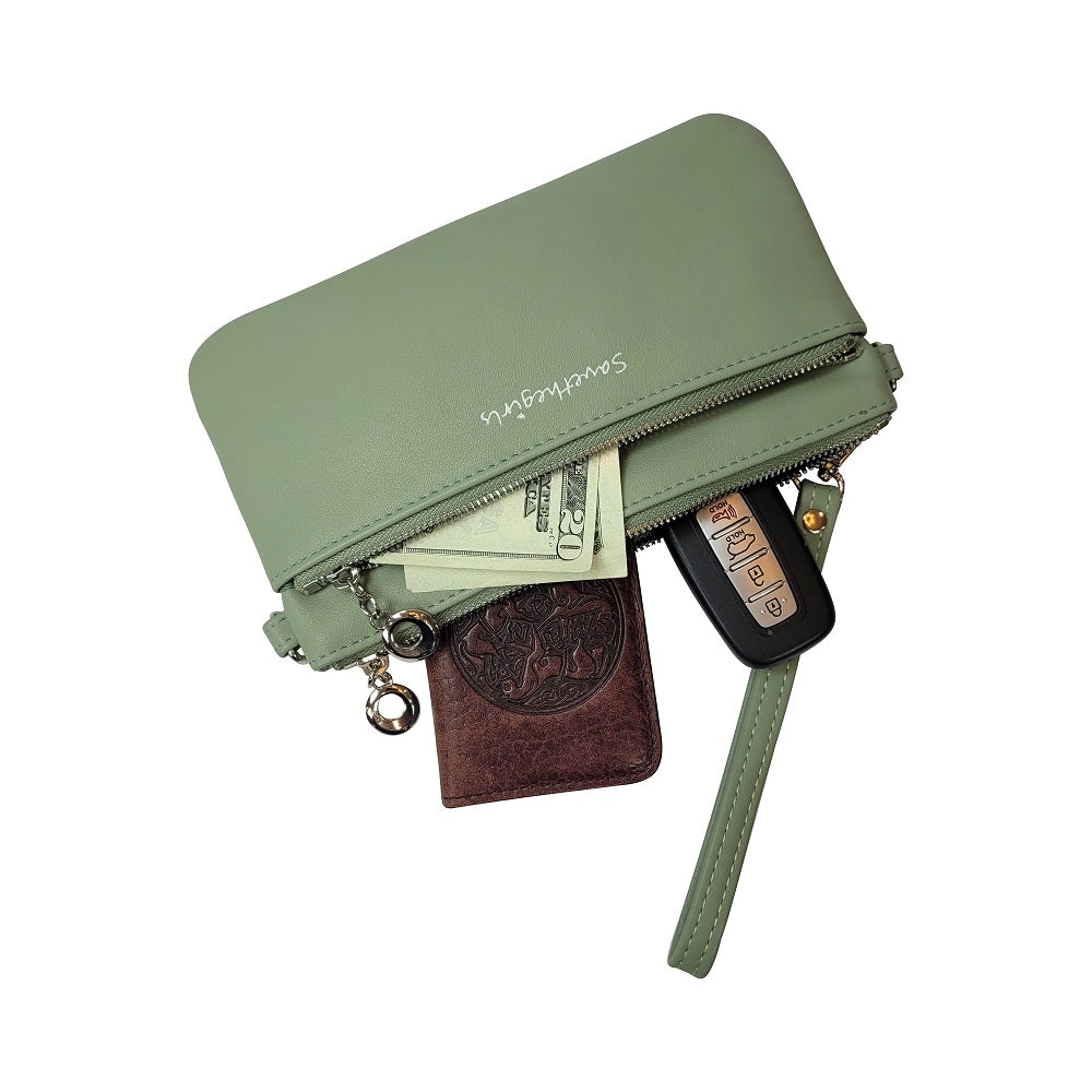 Sage green RFID crossbody pouch open to show cards and keyring