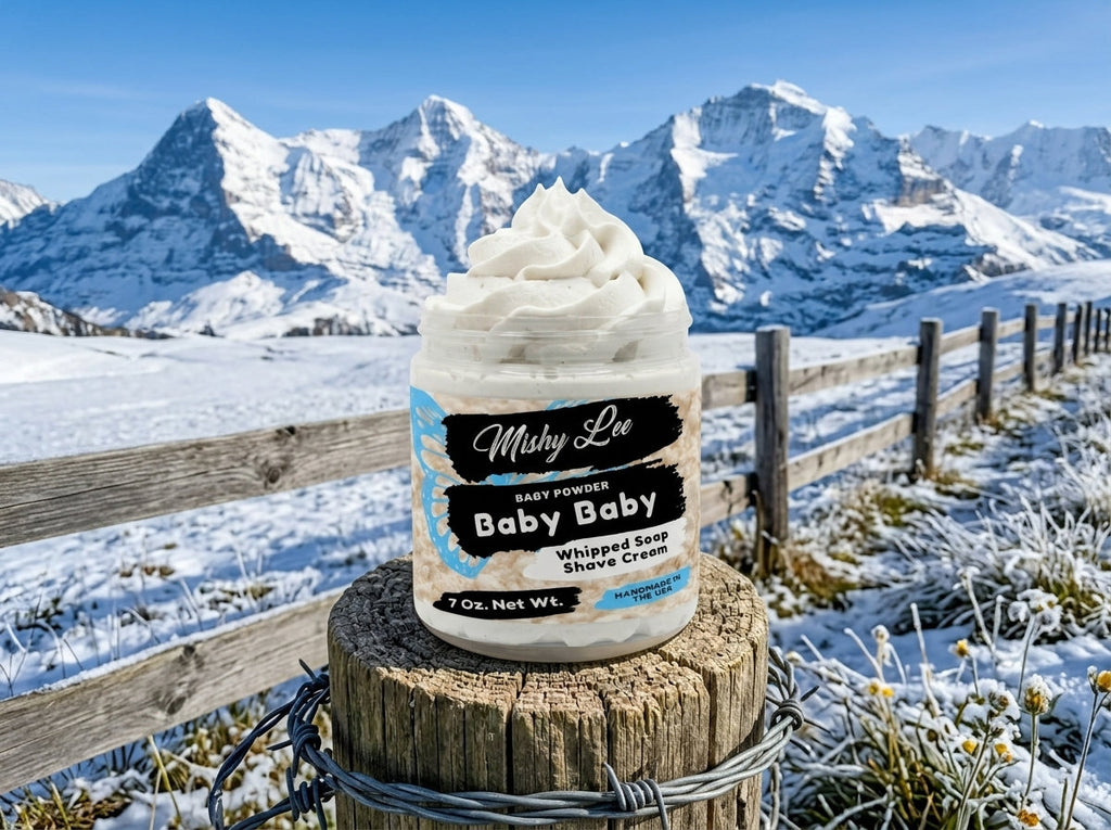 Baby whipped soap and shave cream jar on a stump with white whipped swirl
