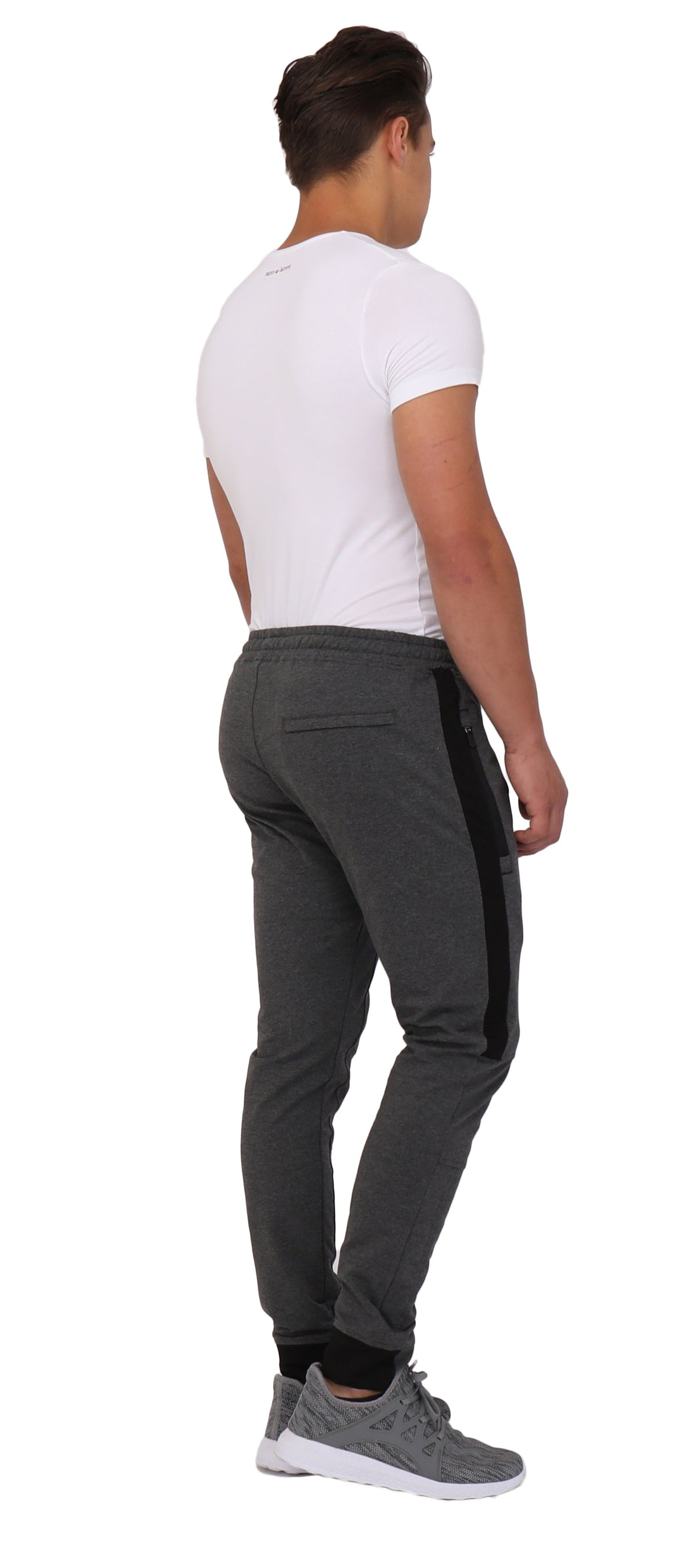 Back view of dark heather grey jogger pants with elastic waistband and side stripe