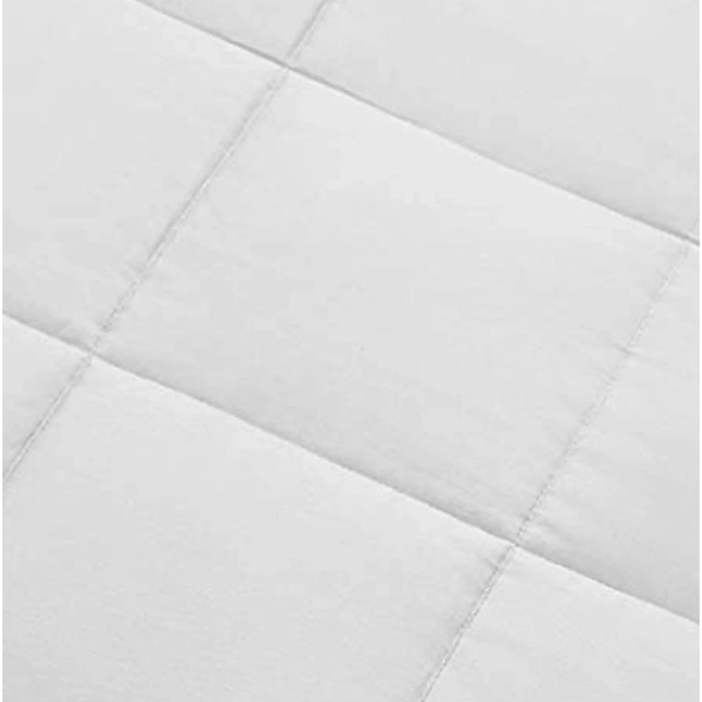 White duvet comforter close-up showing box quilting and stitched channel lines