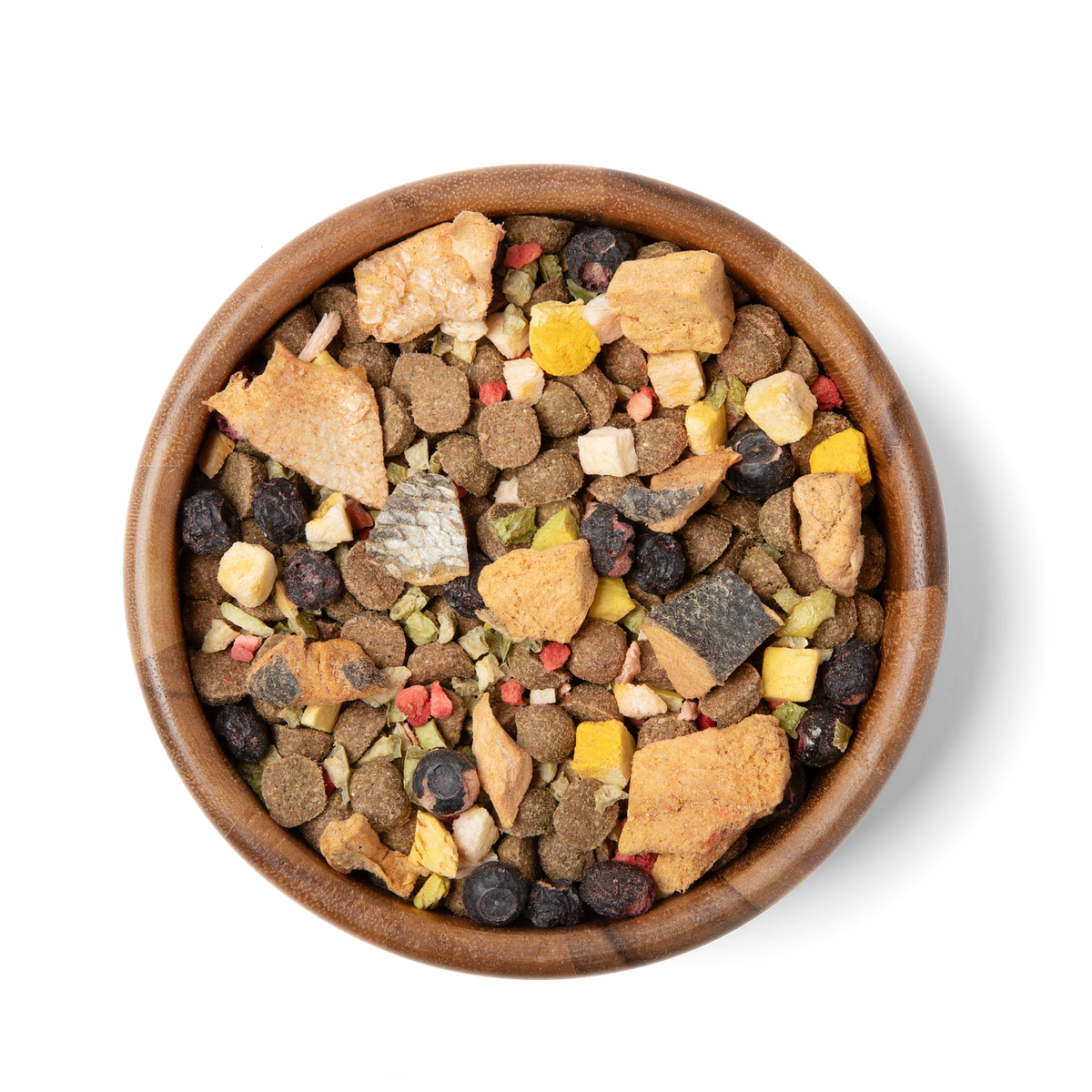 Bowl of freeze-dried trail mix topper with mixed crunchy bites in a wood bowl