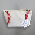 Baseball pouch with red baseball seam print and zip top